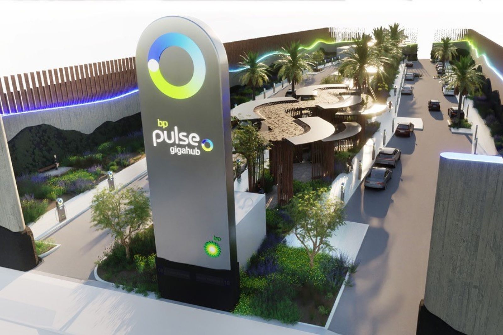 Illustration looking down at a large electric vehicle charging station with several cars parking alongside chargers and a large sign reading "bp pulse gigahub."